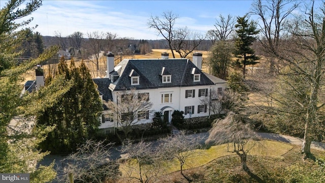 exterior space featuring a chimney