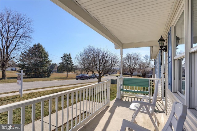 balcony featuring covered porch