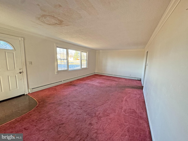 entrance foyer with a textured ceiling, ornamental molding, a baseboard radiator, and carpet flooring