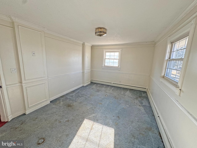 unfurnished room featuring ornamental molding, baseboard heating, and carpet