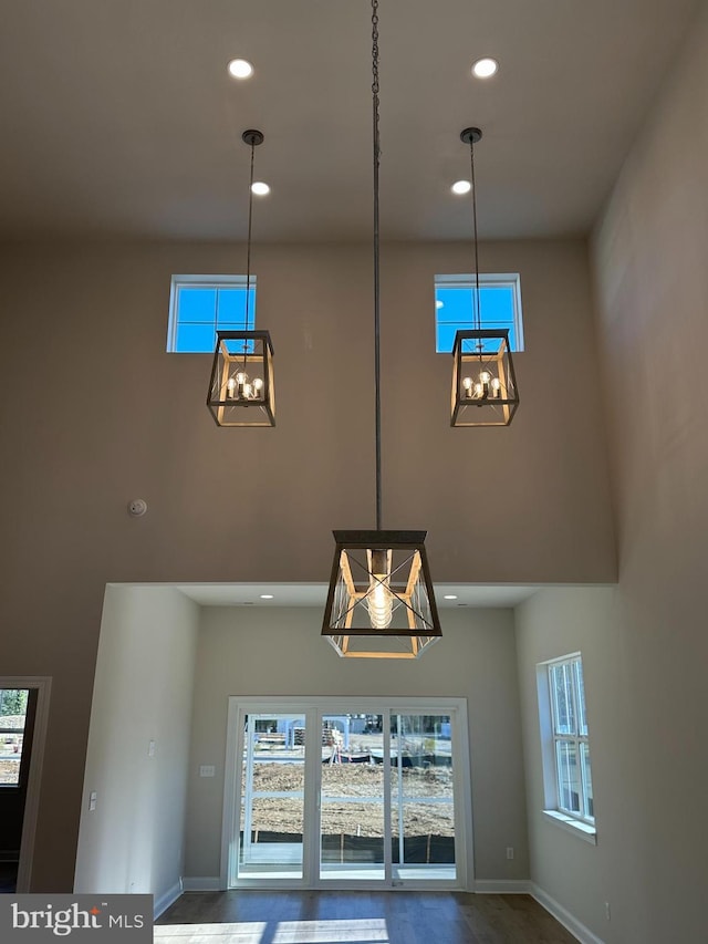 interior details featuring baseboards and recessed lighting