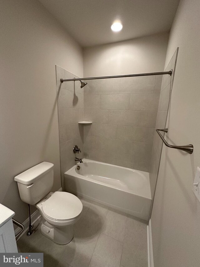 bathroom with  shower combination, tile patterned flooring, vanity, and toilet