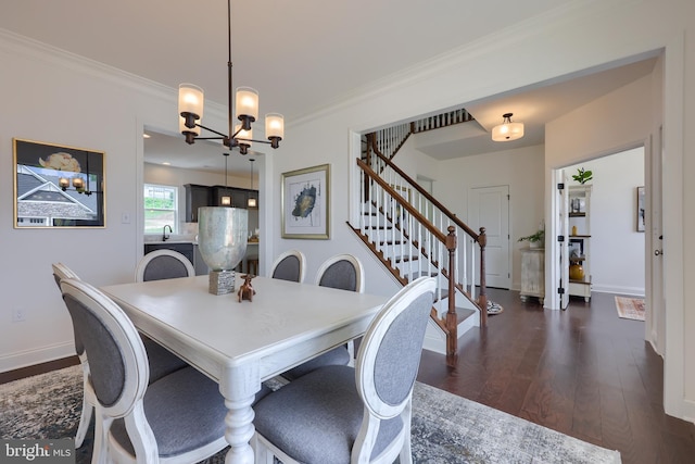 dining area featuring crown molding, stairs, baseboards, and dark wood-type flooring