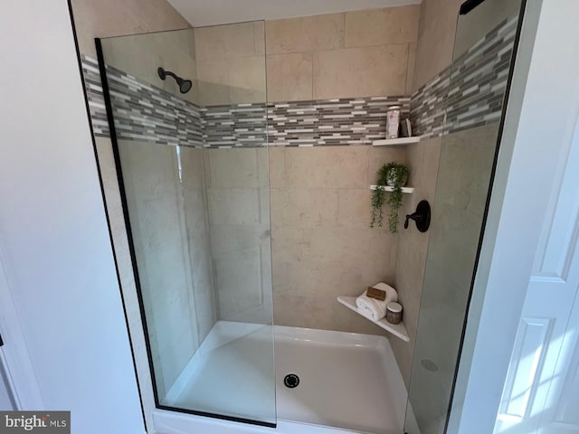 bathroom featuring a stall shower