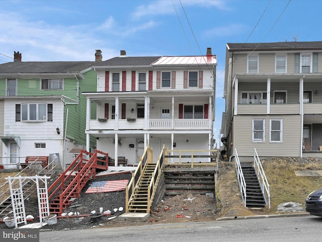 view of front of house featuring stairs