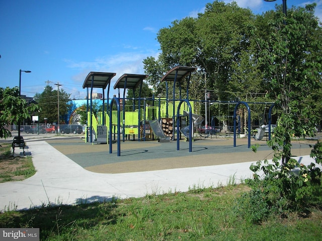 view of home's community with playground community