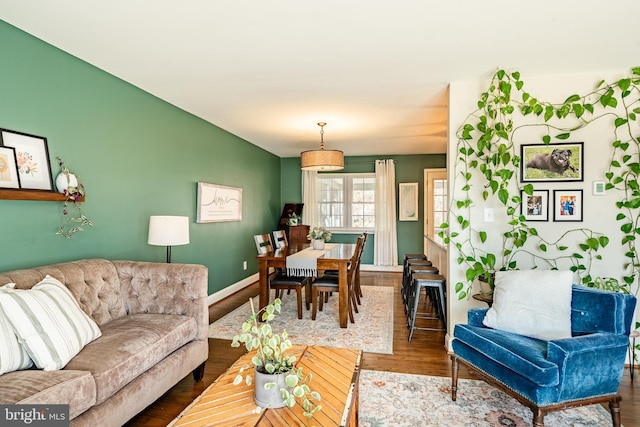 living room with wood finished floors and baseboards