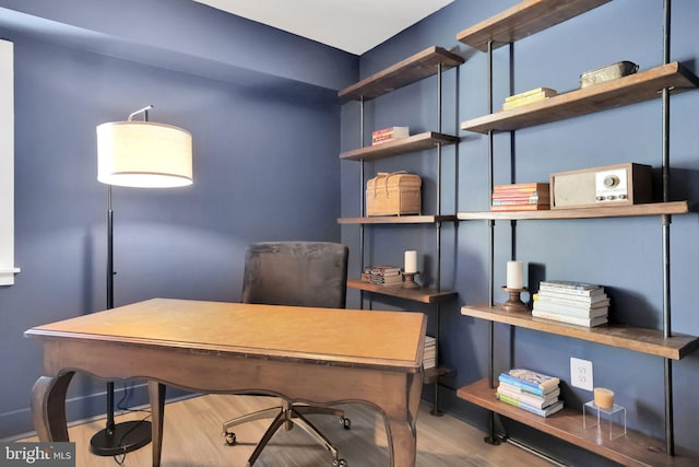 home office with wood finished floors