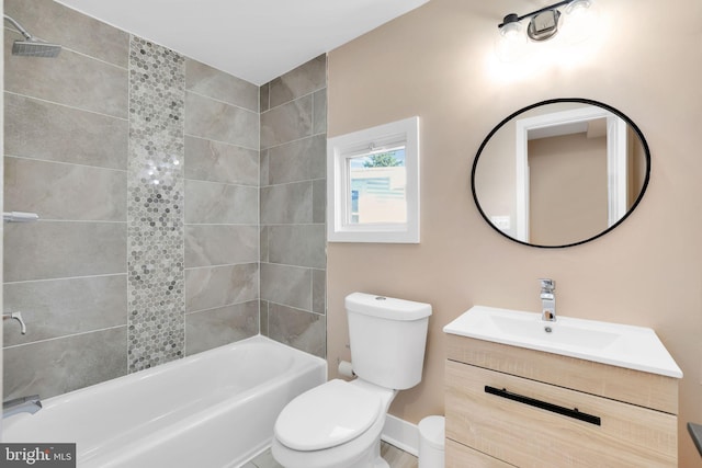 full bath featuring toilet, vanity, and shower / bathing tub combination