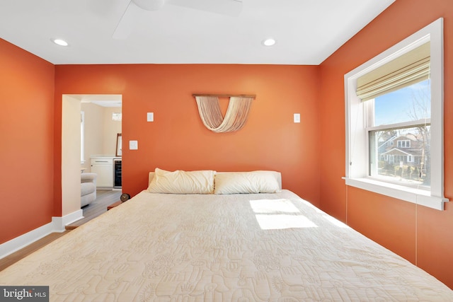 bedroom with a ceiling fan, baseboards, and recessed lighting
