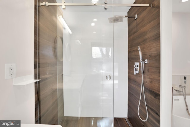 bathroom featuring a shower stall