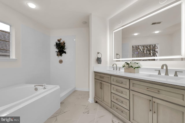 full bath with a sink, visible vents, marble finish floor, and double vanity