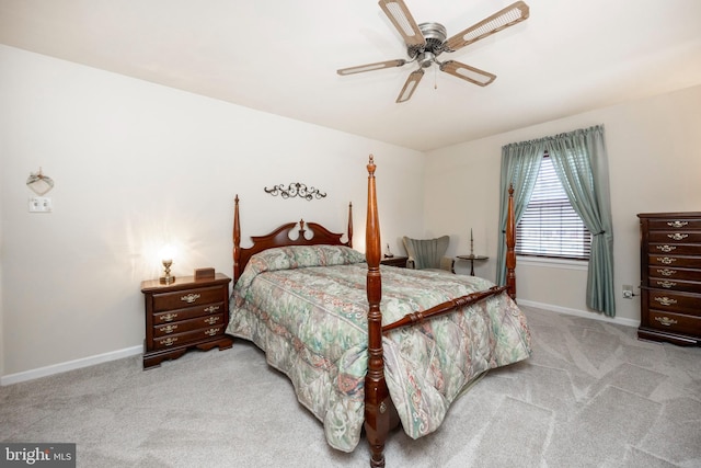 bedroom featuring baseboards, carpet, and a ceiling fan