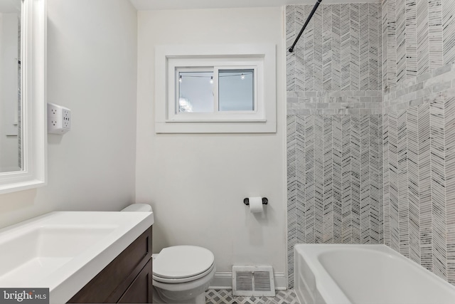 full bathroom featuring toilet, baseboards, visible vents, and vanity