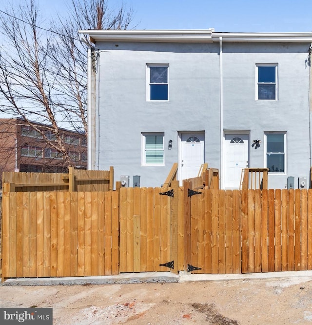 townhome / multi-family property with fence