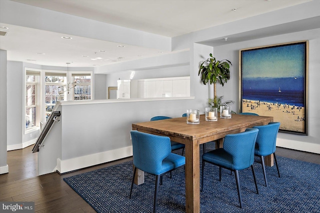 dining area with visible vents, baseboards, wood finished floors, and recessed lighting