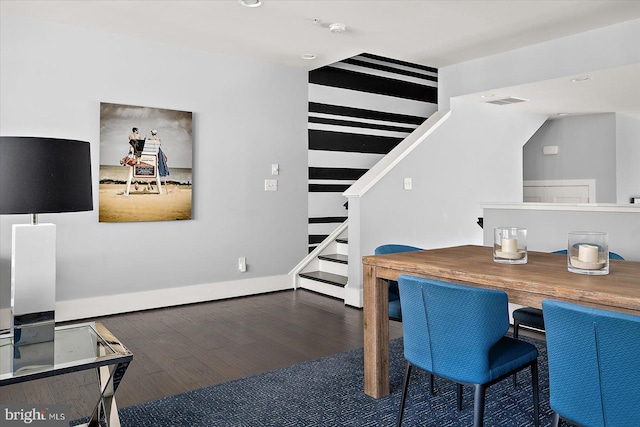 home office with wood finished floors and baseboards