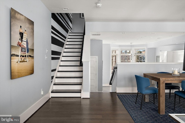 dining area with baseboards, visible vents, stairway, wood finished floors, and recessed lighting