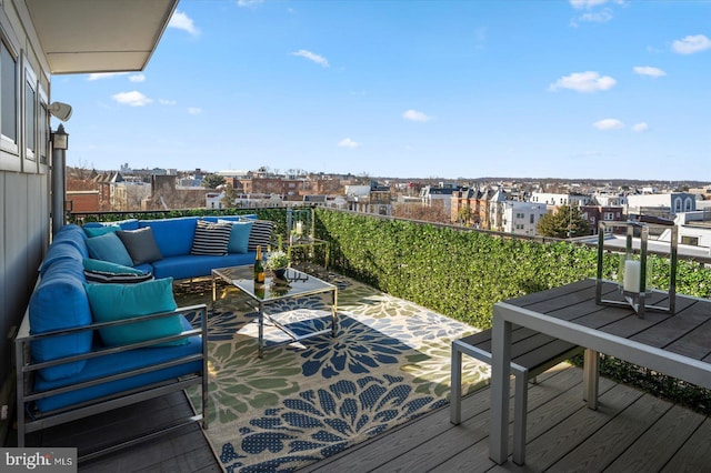 deck with an outdoor hangout area