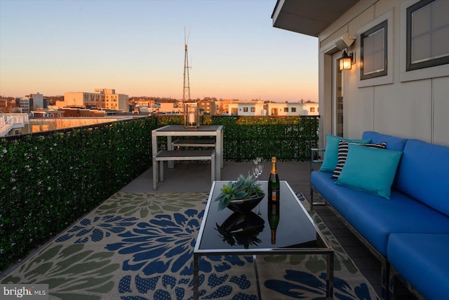 balcony with an outdoor hangout area