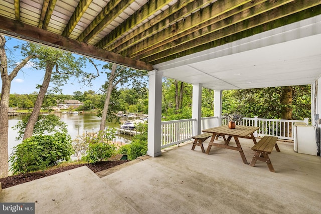 141 Boone Trl, Severna Park, MD 21146 - view of patio with a water view, view of scattered trees, and outdoor dining area