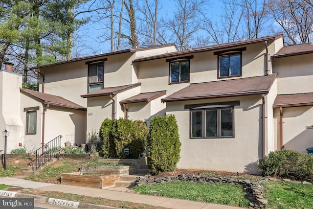 view of front of house with stucco siding