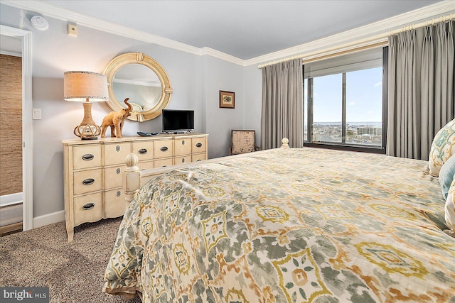 bedroom with carpet flooring, baseboards, and ornamental molding