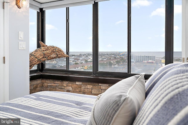 bedroom featuring multiple windows