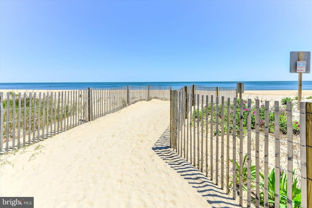 property view of water featuring a view of the beach