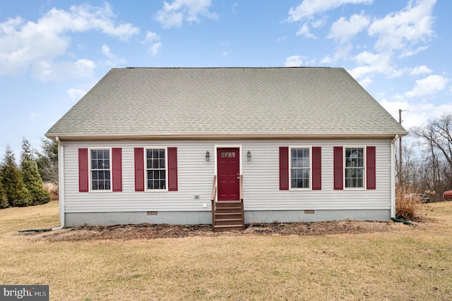 view of front of home featuring entry steps, crawl space, roof with shingles, and a front yard