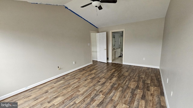 unfurnished room featuring a ceiling fan, lofted ceiling, baseboards, and wood finished floors