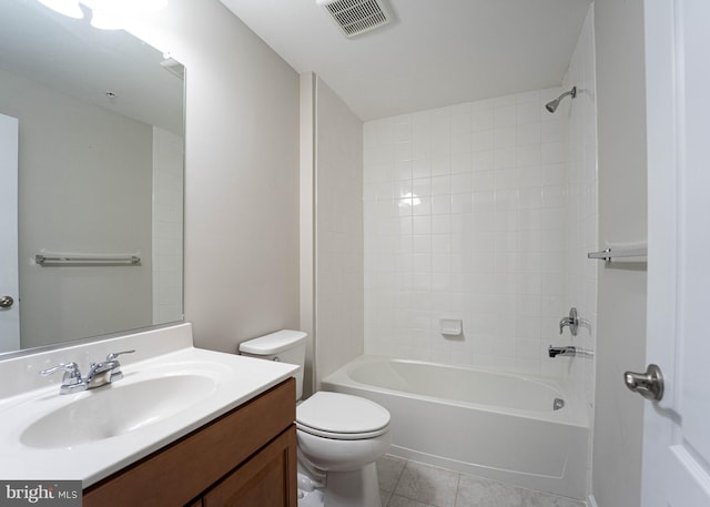 bathroom with tile patterned floors, visible vents, toilet, bathing tub / shower combination, and vanity