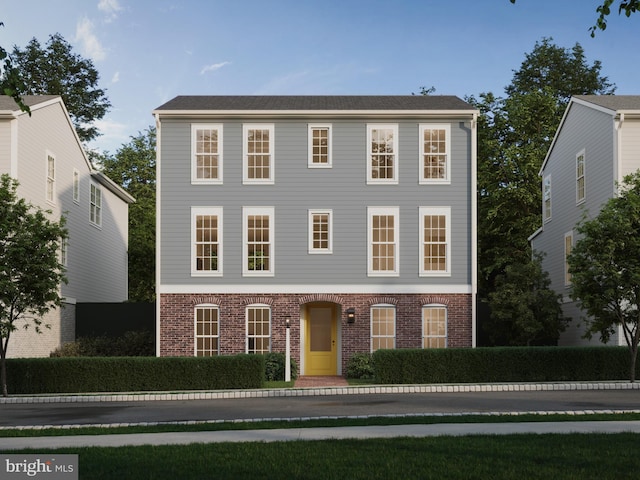 view of front facade with brick siding