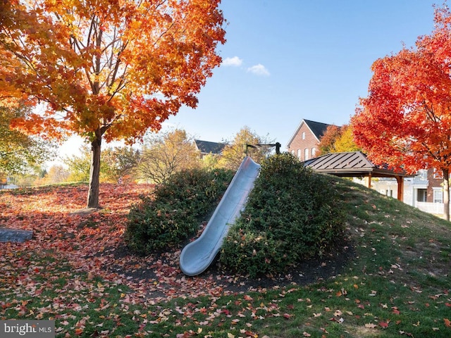 view of playground featuring a yard