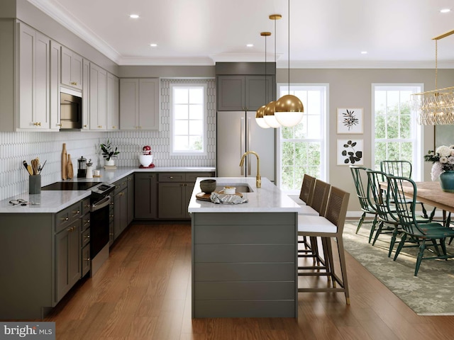 kitchen featuring fridge, black microwave, crown molding, and range with electric stovetop