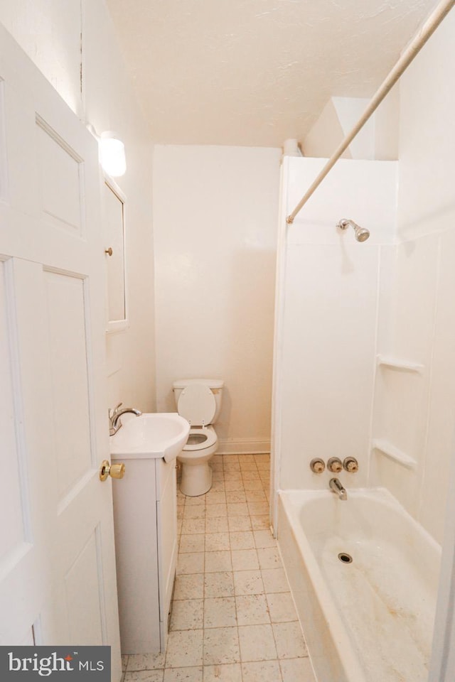 bathroom with toilet, tile patterned floors, bathtub / shower combination, and vanity