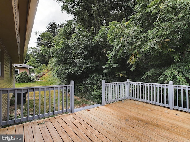 deck featuring a yard