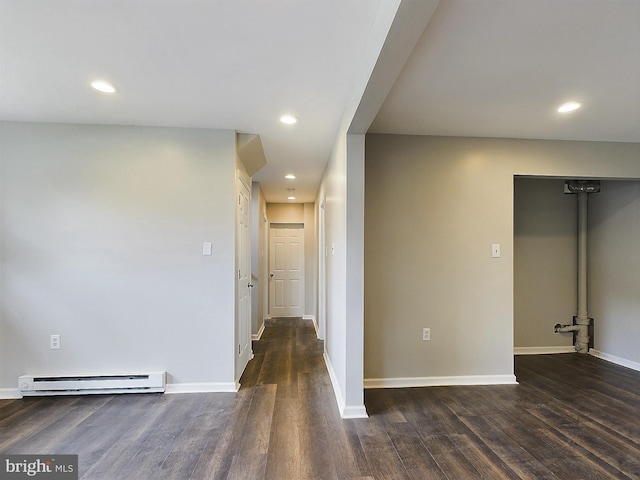 corridor with a baseboard radiator, dark wood-style flooring, baseboards, and recessed lighting