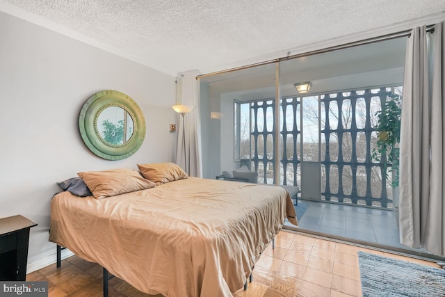 bedroom featuring a textured ceiling