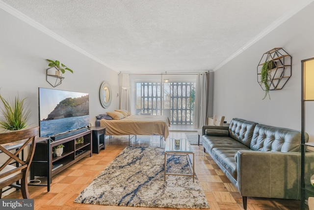 living room with a textured ceiling and crown molding