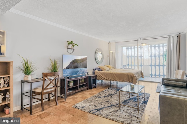 living room featuring baseboards, ornamental molding, and a textured ceiling