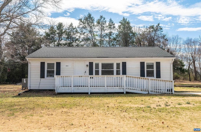 ranch-style home with a front lawn