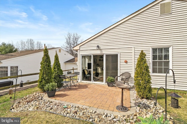 view of patio featuring fence