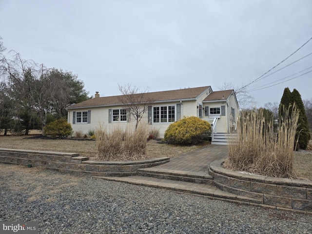 view of front of property with a chimney