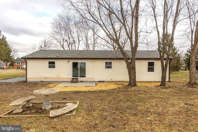 back of house featuring a patio and crawl space