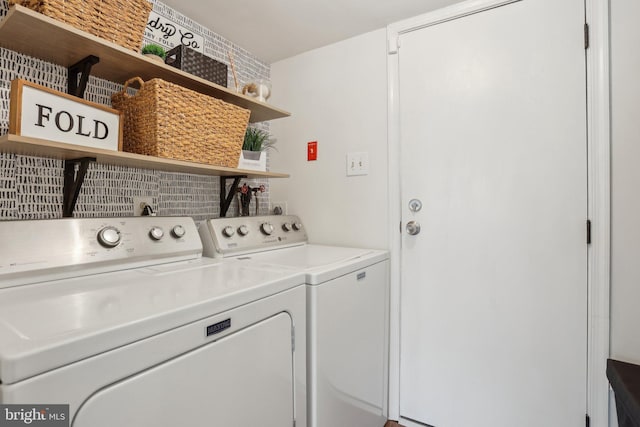 washroom with laundry area and independent washer and dryer