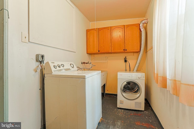 laundry area with cabinet space and washer and dryer