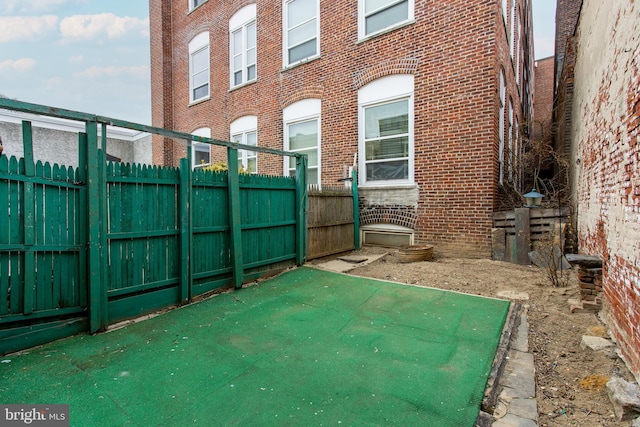 view of patio / terrace featuring fence