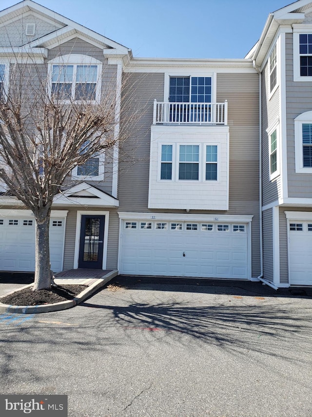 multi unit property featuring a balcony