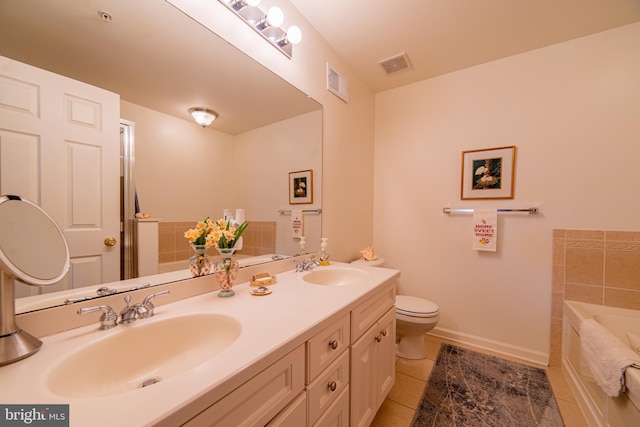 full bathroom featuring a sink, visible vents, a garden tub, and tile patterned floors